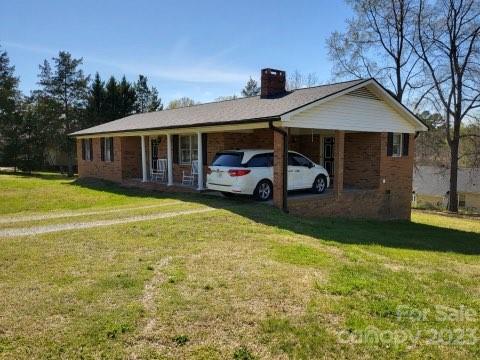 1366 Ridge Avenue Mount Pleasant, NC 28124 - Photo 3 of 28 a house view with a garden space