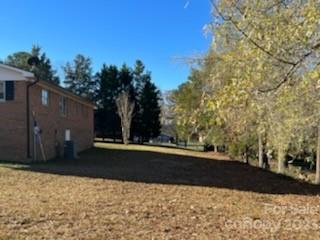 1366 Ridge Avenue Mount Pleasant, NC 28124 - Photo 4 of 28 a view of a back yard of the house