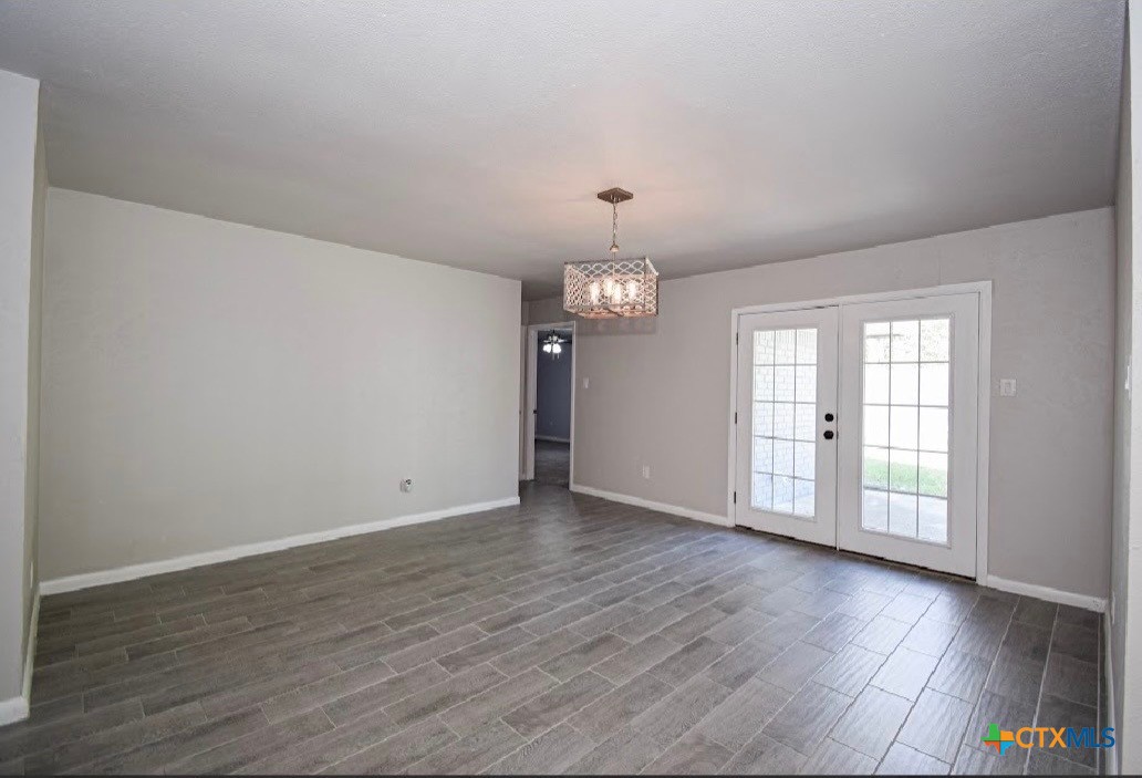 205 Tanglewood Road Temple, TX 76502 - Photo 7 of 26 Dining room with french doors to patio