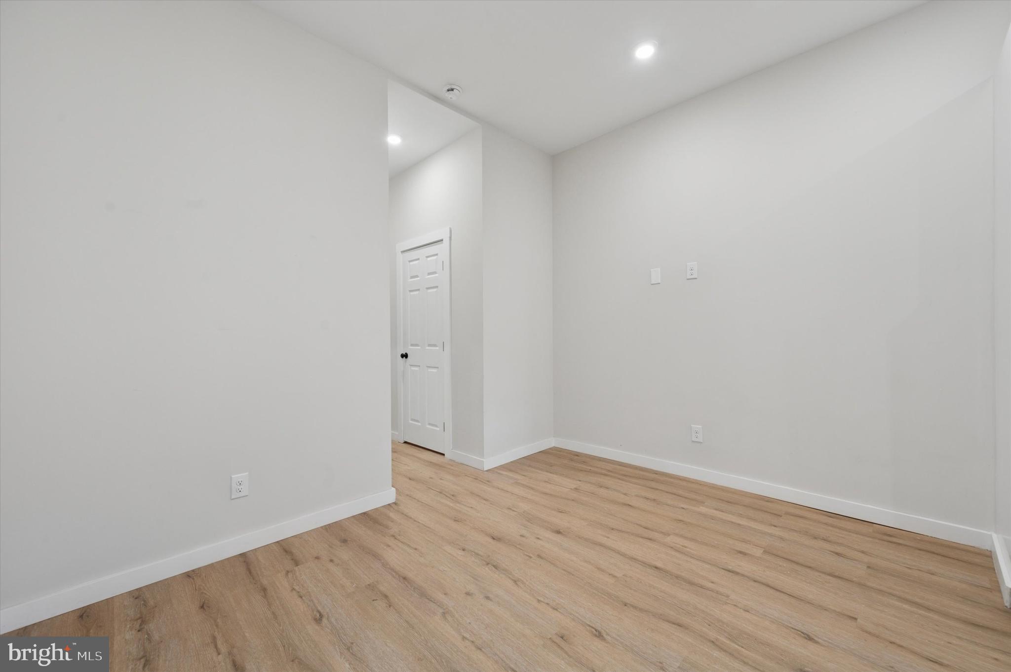 255 South 44th Street, Unit 1 Philadelphia, PA 19104 - Photo 14 of 26 a view of room with wooden floor