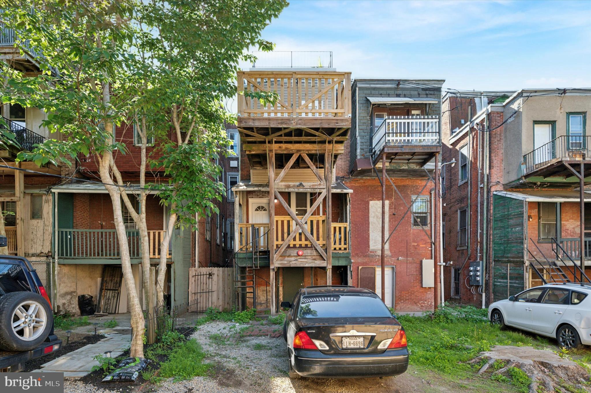 255 South 44th Street, Unit 1 Philadelphia, PA 19104 - Photo 2 of 26 a car parked in front of a house