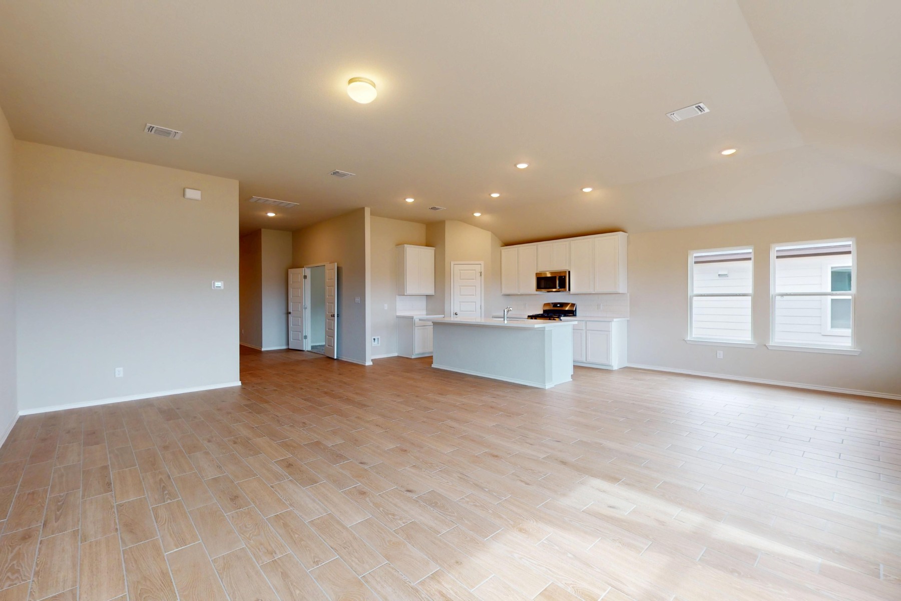 20009 Hirono Drive Manor, TX 78653 - Photo 11 of 39 a view of an empty room with a window