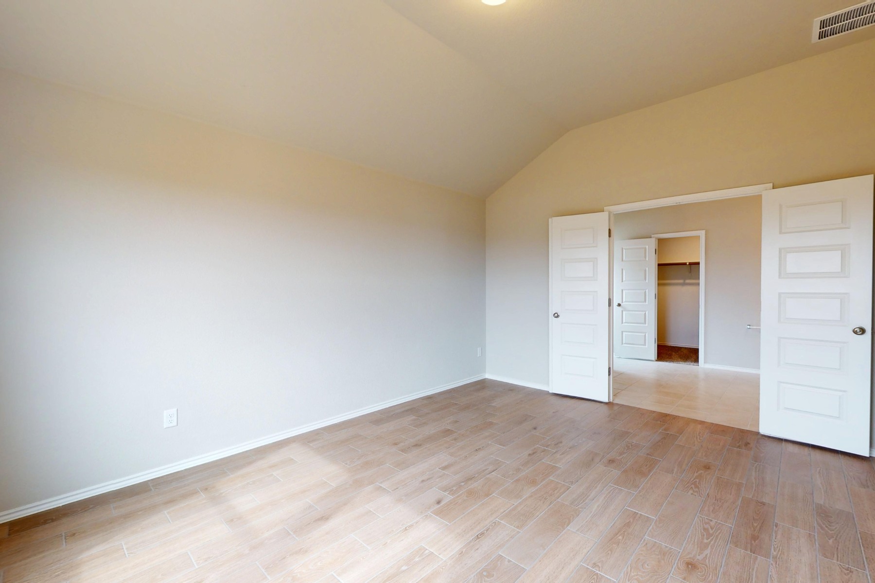 20009 Hirono Drive Manor, TX 78653 - Photo 15 of 39 a view of an empty room with wooden floor