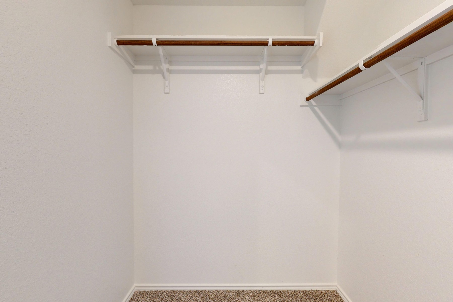 20009 Hirono Drive Manor, TX 78653 - Photo 18 of 39 a view of small space with racks on the wall