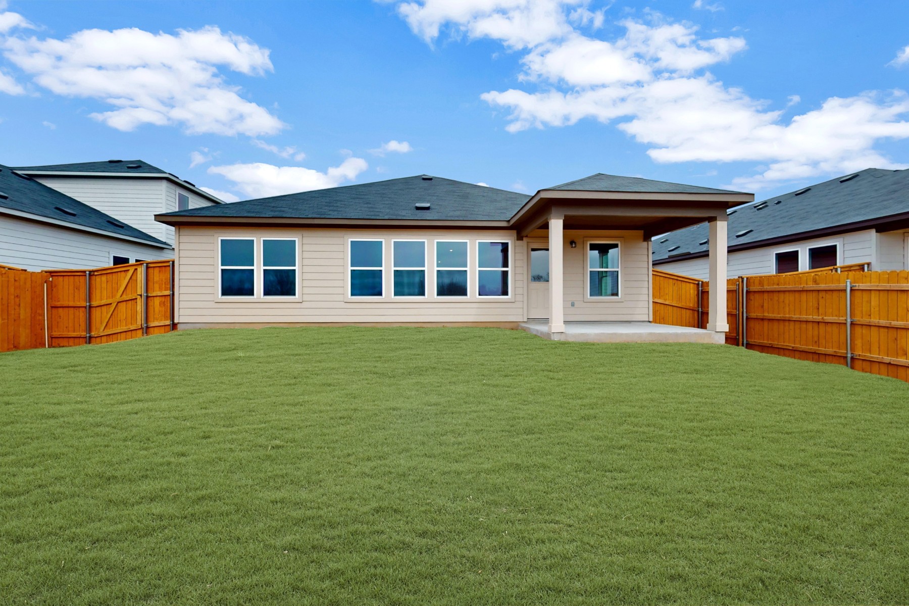 20009 Hirono Drive Manor, TX 78653 - Photo 19 of 39 a front view of a house with a yard