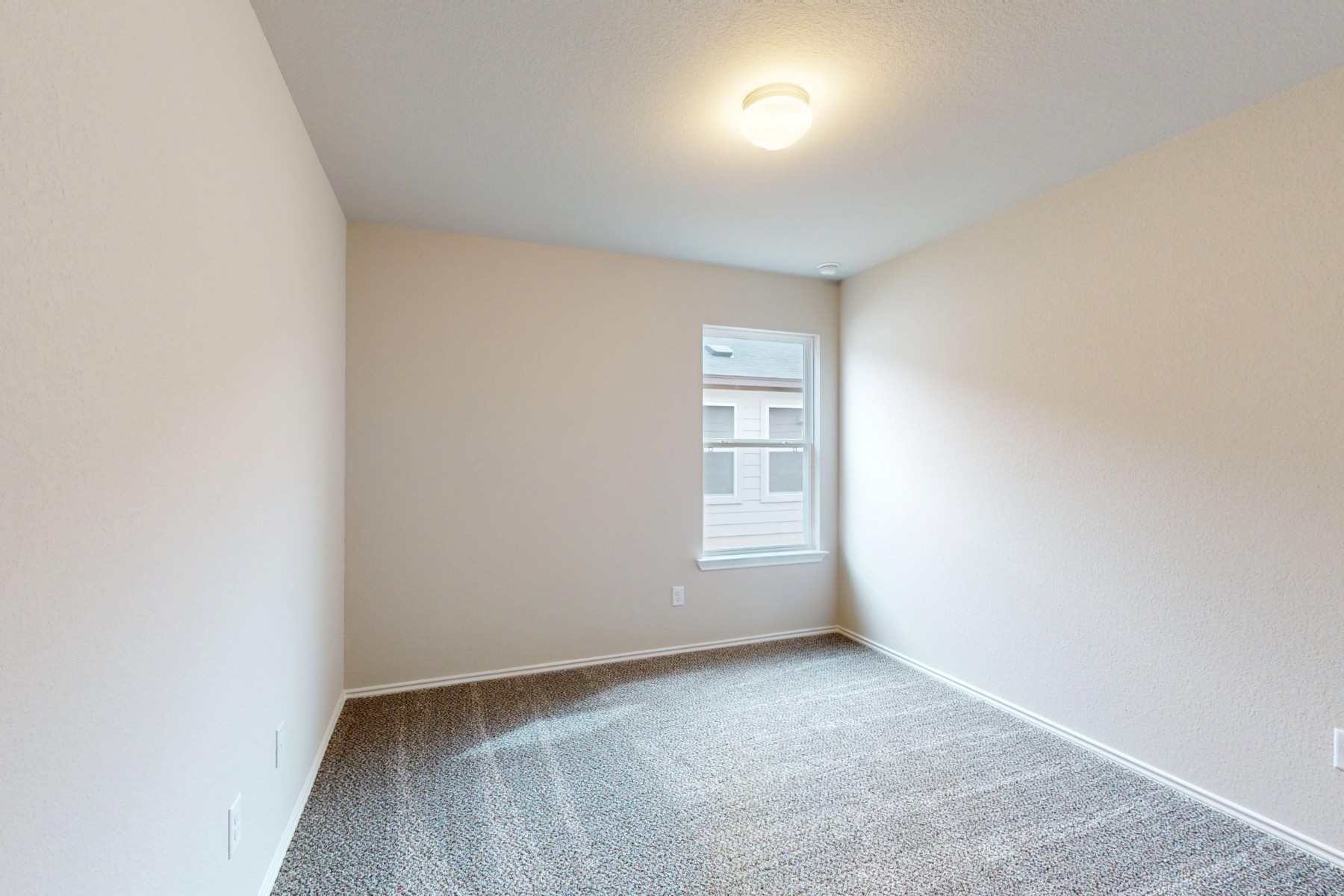 20009 Hirono Drive Manor, TX 78653 - Photo 27 of 39 an empty room with windows