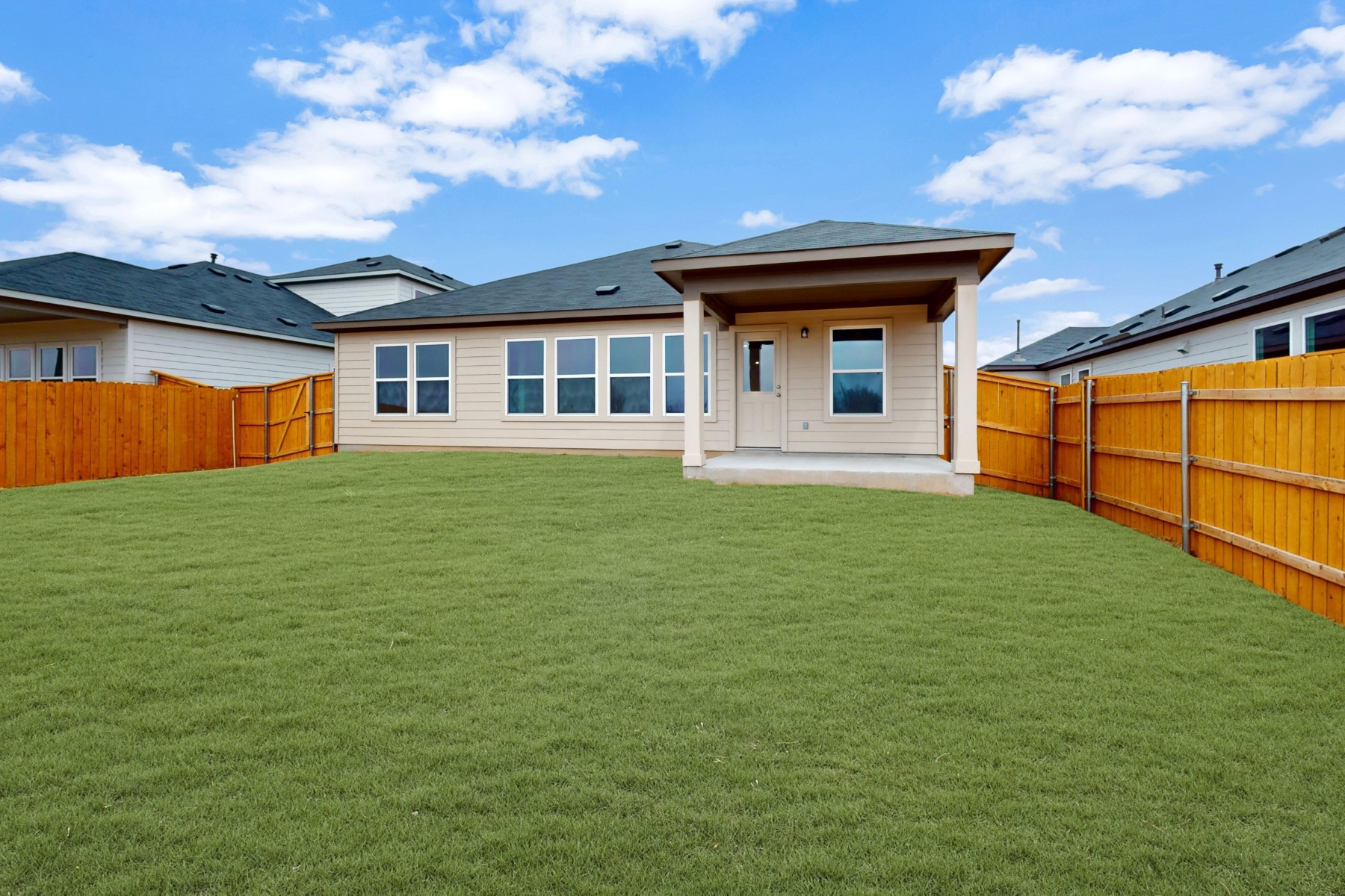 20009 Hirono Drive Manor, TX 78653 - Photo 35 of 39 a front view of a house with garden