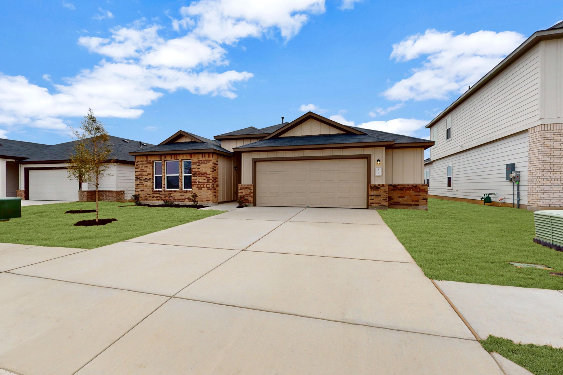 20009 Hirono Drive Manor, TX 78653 - Photo 37 of 39 a front view of a house with a yard