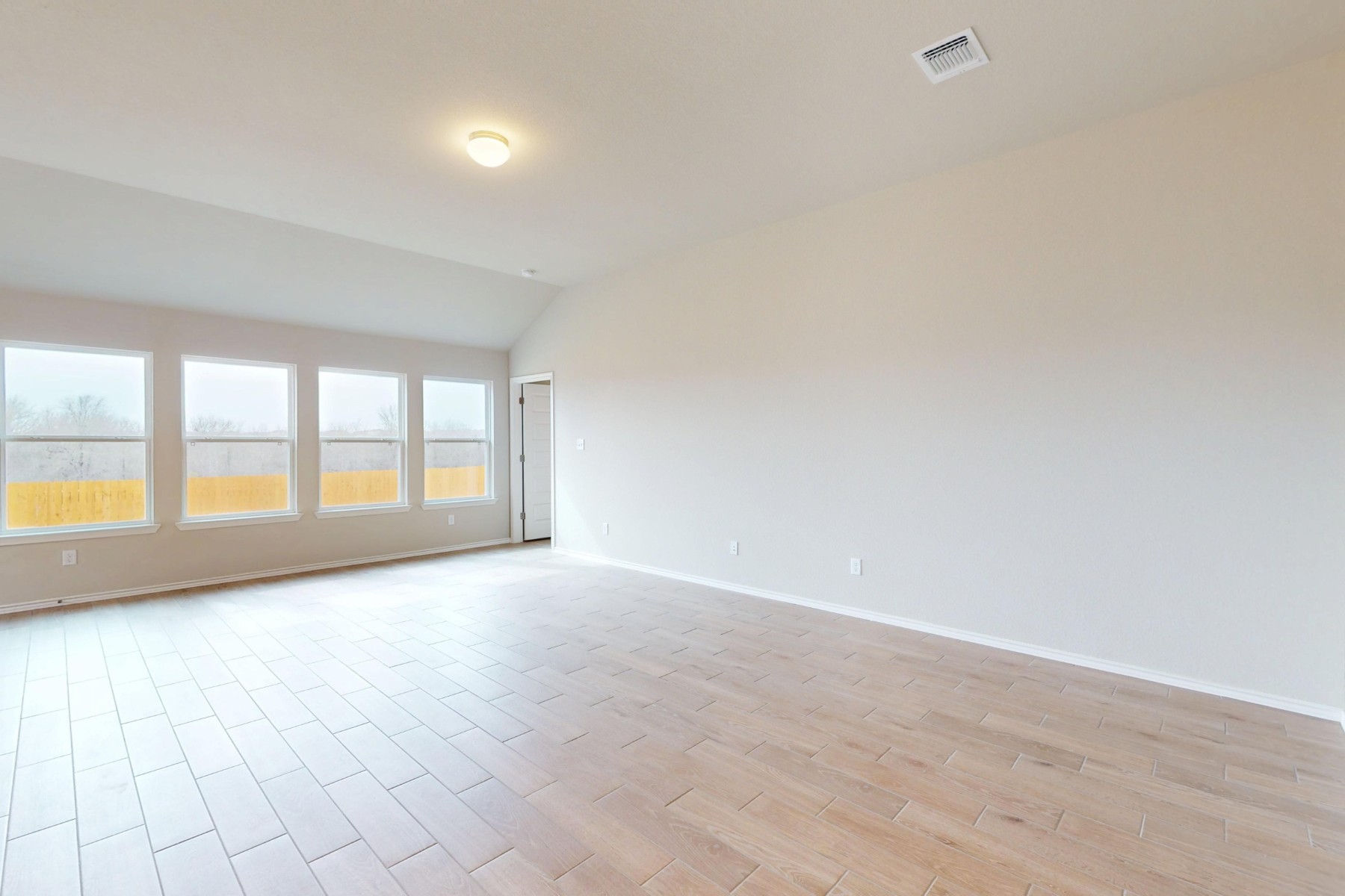 20009 Hirono Drive Manor, TX 78653 - Photo 10 of 39 a view of an empty room with a window