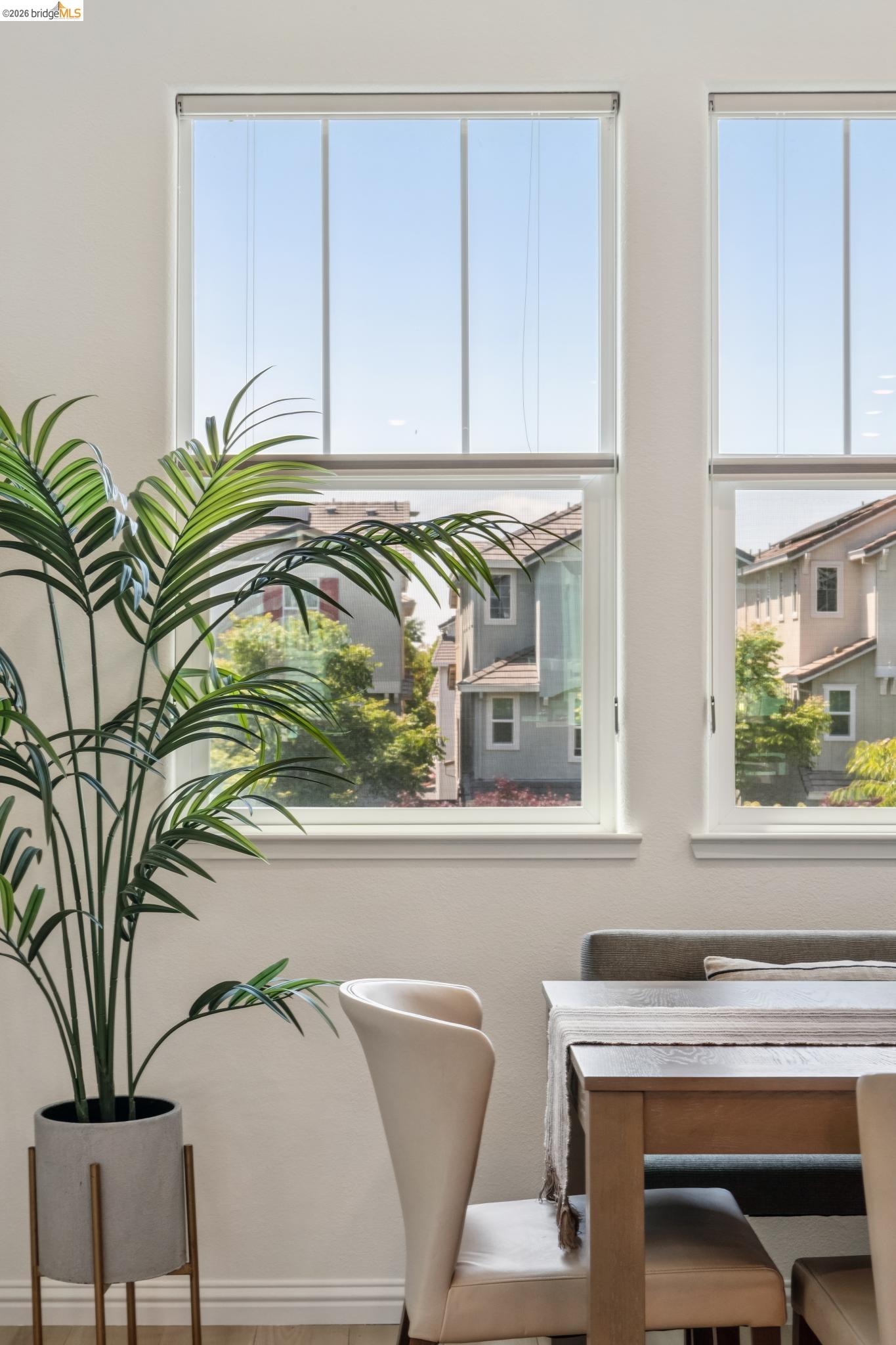 24157 Amaranth Loop Hayward, CA 94541 - Photo 30 of 63 Bright interior space featuring multiple large windows with roller shades