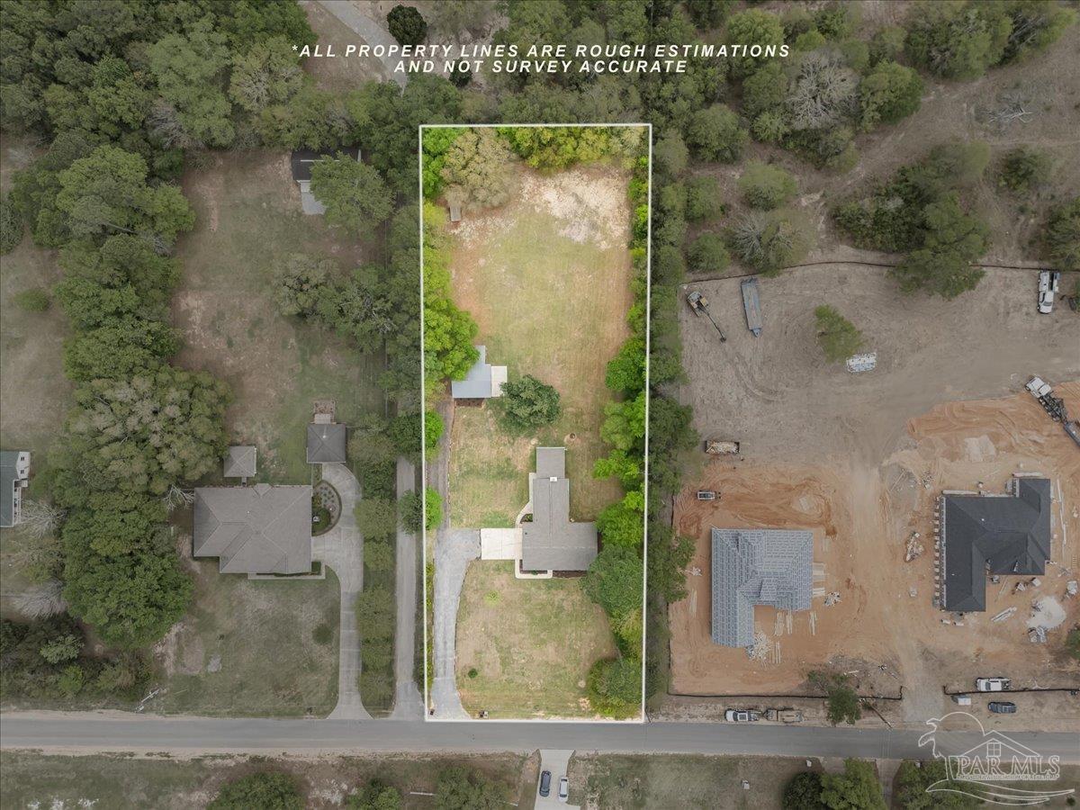 5946 Greenfield Street Pace, FL 32571 - Photo 2 of 42 an aerial view of a house