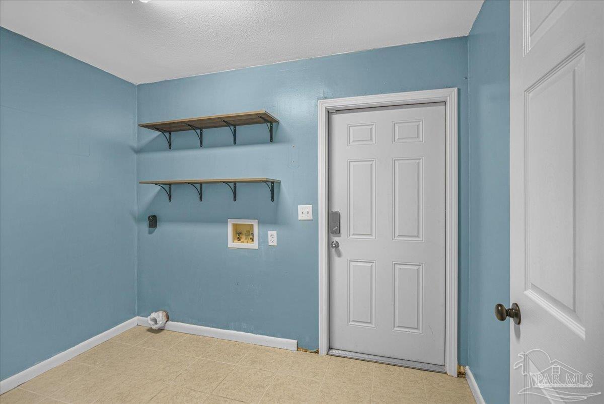 5946 Greenfield Street Pace, FL 32571 - Photo 27 of 42 a view of an empty room
