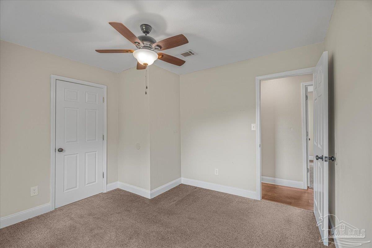 5946 Greenfield Street Pace, FL 32571 - Photo 31 of 42 a view of an empty room