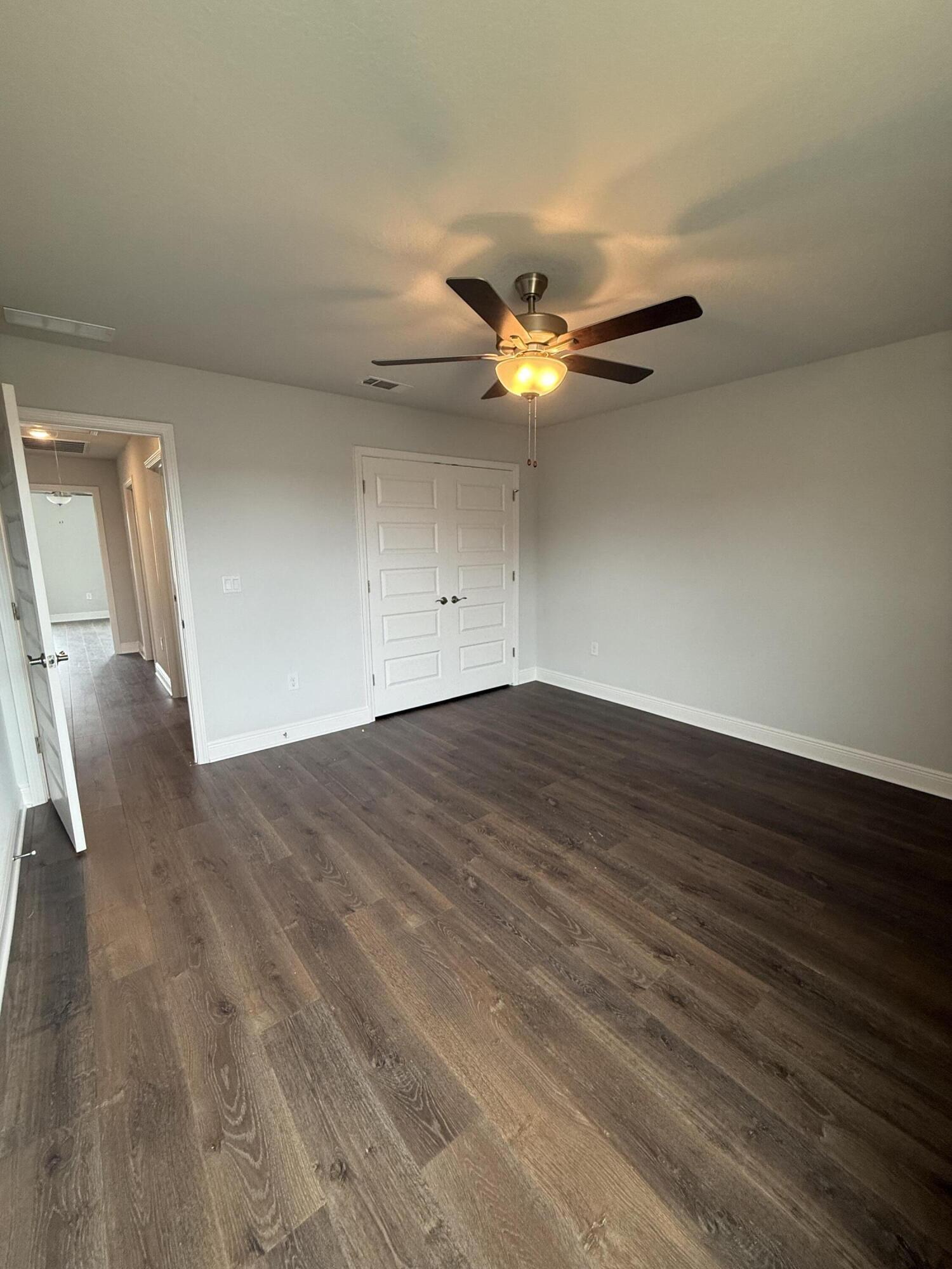 185 Ridgeway Circle Crestview, FL 32536 - Photo 24 of 30 wooden floor in an empty room