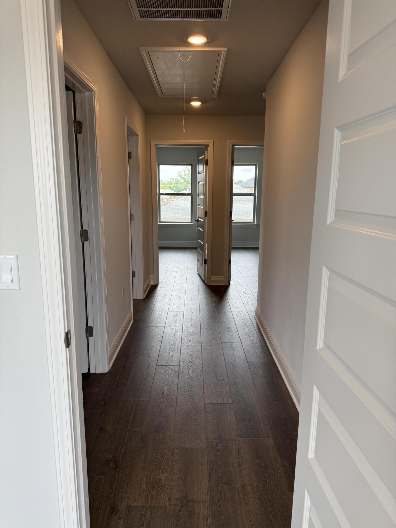 185 Ridgeway Circle Crestview, FL 32536 - Photo 27 of 30 a view of gallery with wooden floor
