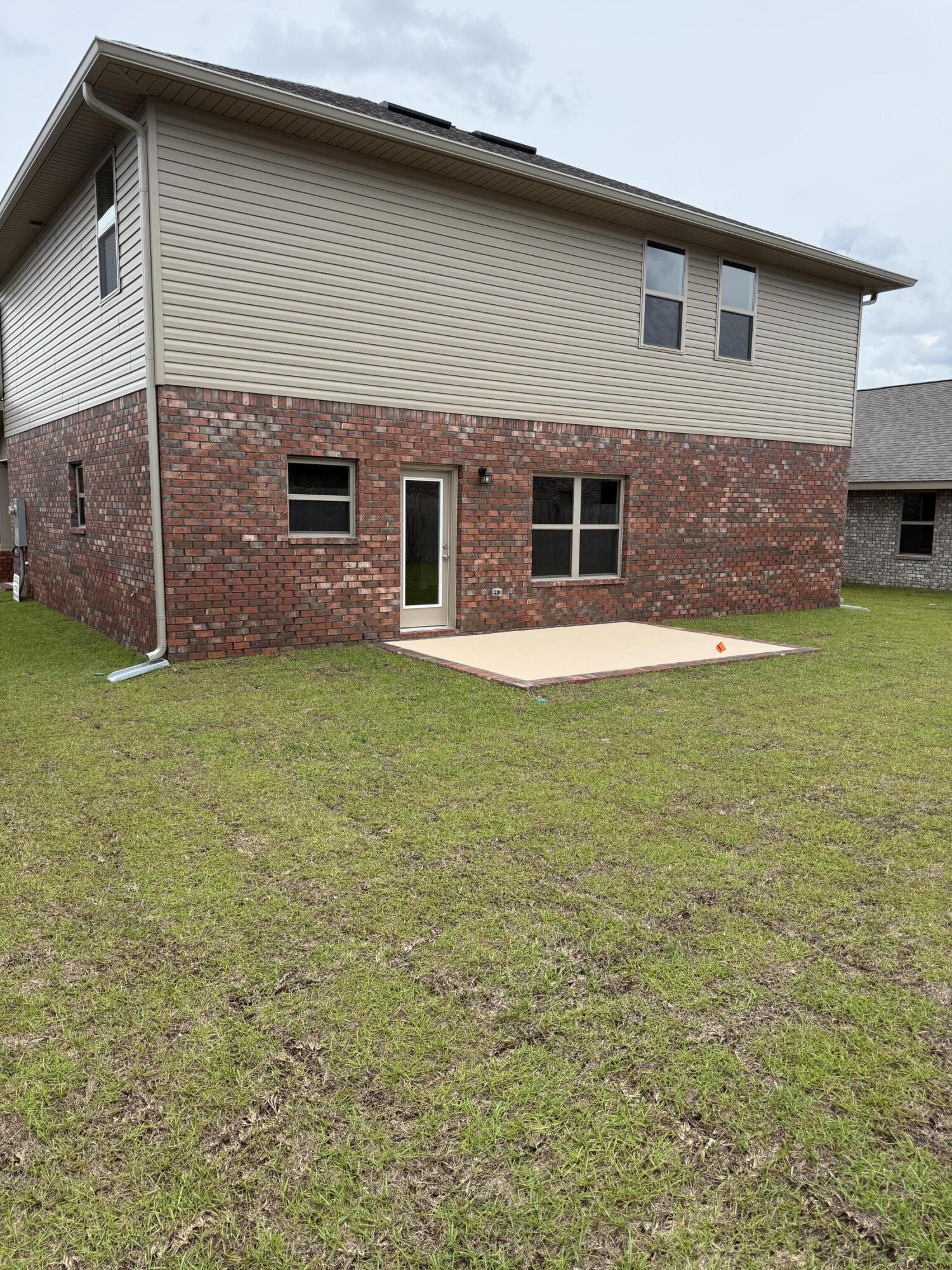 185 Ridgeway Circle Crestview, FL 32536 - Photo 28 of 30 a house that has a big yard in front of it