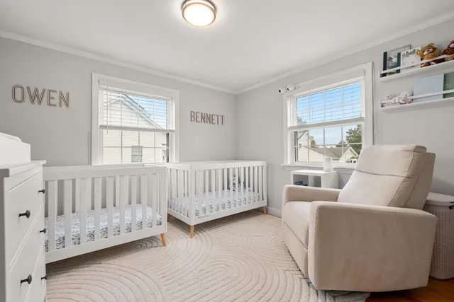 a bedroom with furniture and a window