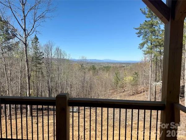 a view of a balcony with an outdoor space