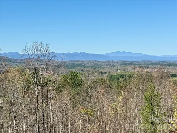 a view of mountain with lake view