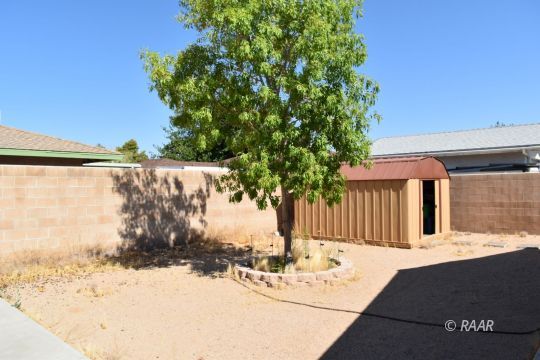 111 North American Street Ridgecrest, CA 93555 - Photo 9 of 10 a view of a house with a snow