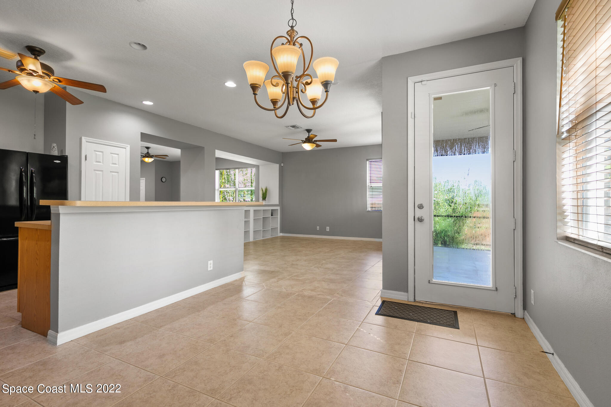 1963 Jupiter Boulevard Southwest Palm Bay, FL 32908 - Photo 12 of 42 a view of a kitchen and a window