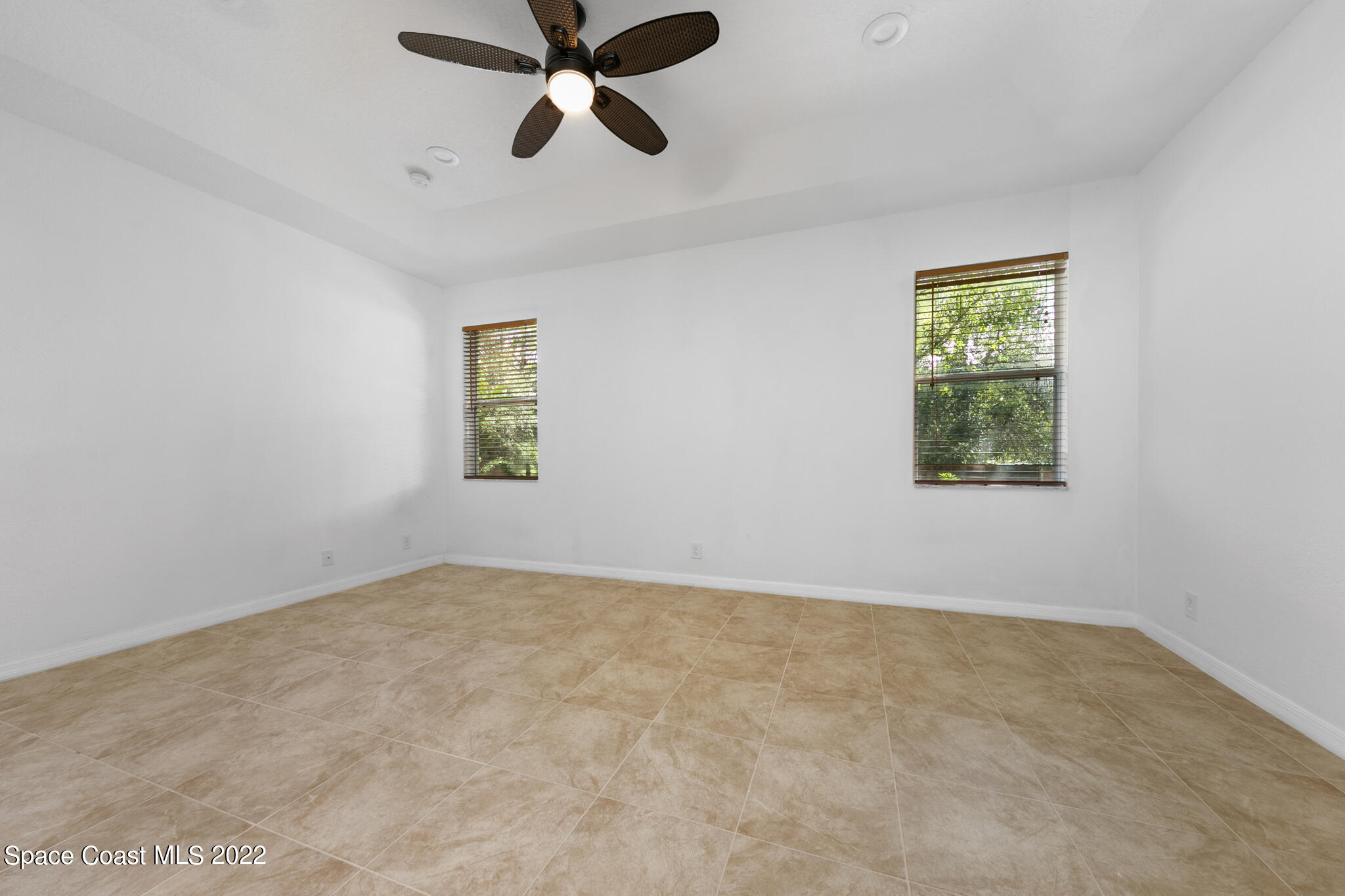 1963 Jupiter Boulevard Southwest Palm Bay, FL 32908 - Photo 33 of 42 a view of an empty room with a window