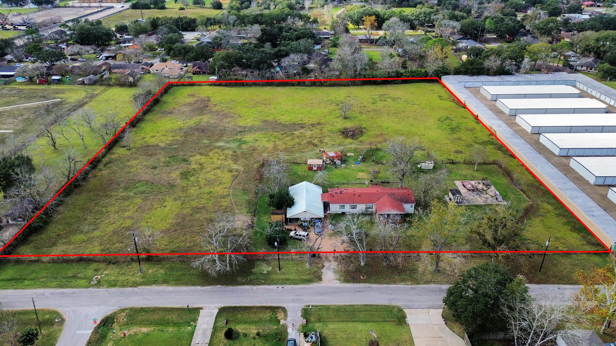 1500 South Durant Street Alvin, TX 77511 - Photo 3 of 5 a view of swimming pool with outdoor seating and lake view