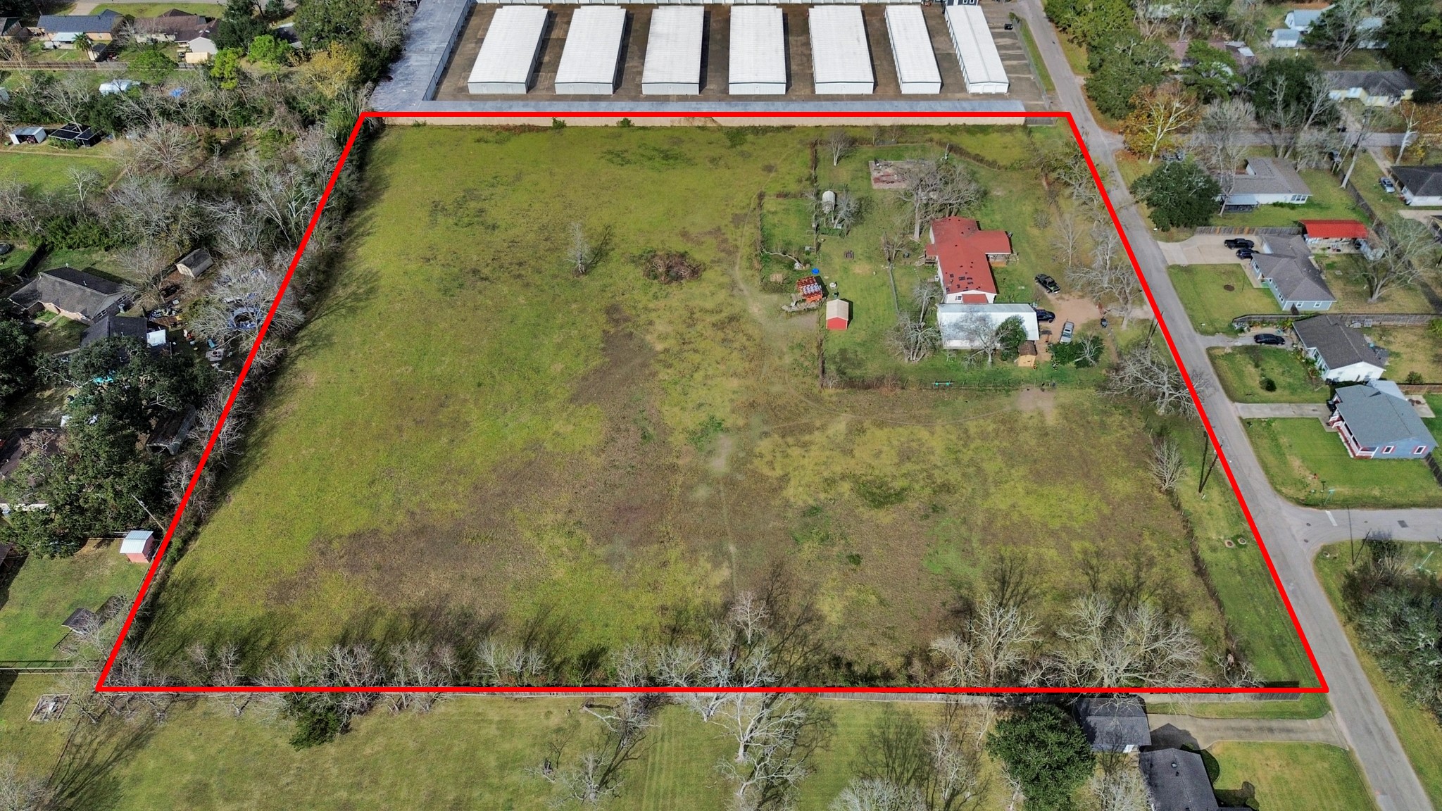 1500 South Durant Street Alvin, TX 77511 - Photo 5 of 5 a view of swimming pool with a garden and flowers