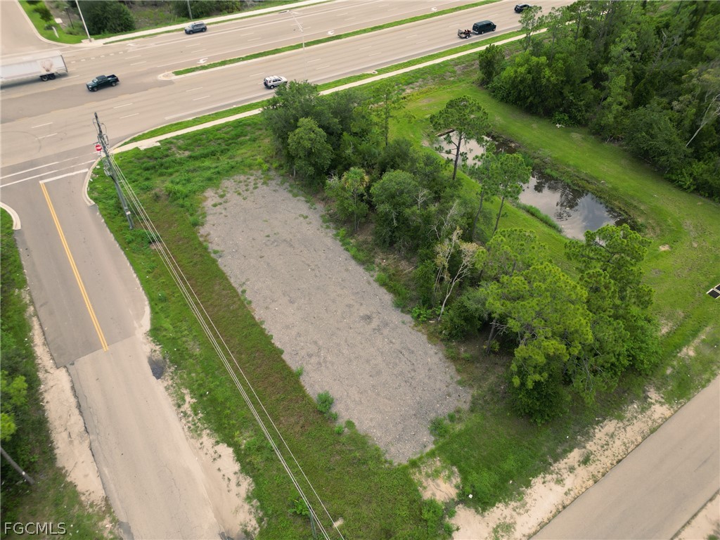 910 Meadow Road Lehigh Acres, FL 33913 - Photo 12 of 12 a green field with lots of green space