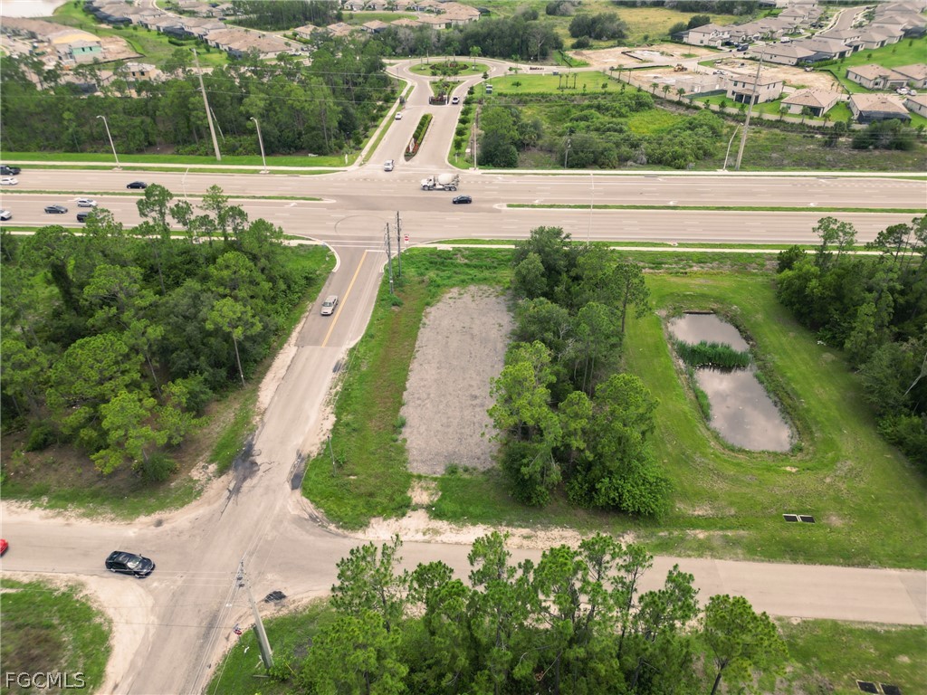 910 Meadow Road Lehigh Acres, FL 33913 - Photo 3 of 12 an aerial view of a