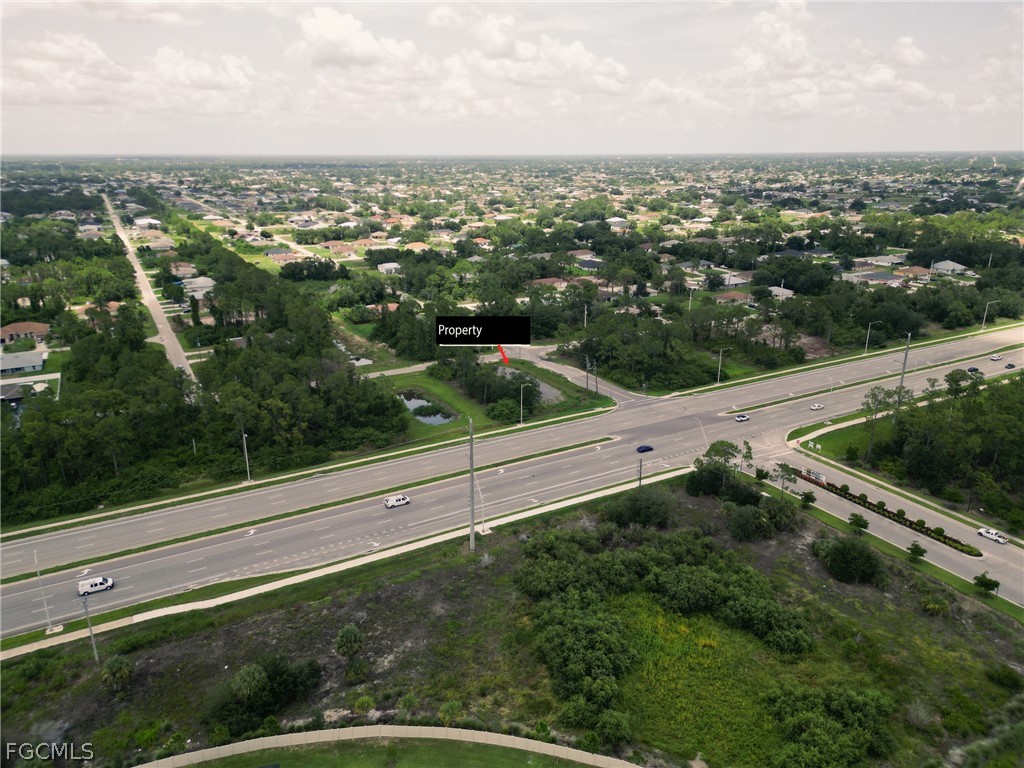 910 Meadow Road Lehigh Acres, FL 33913 - Photo 6 of 12 a view of city from balcony