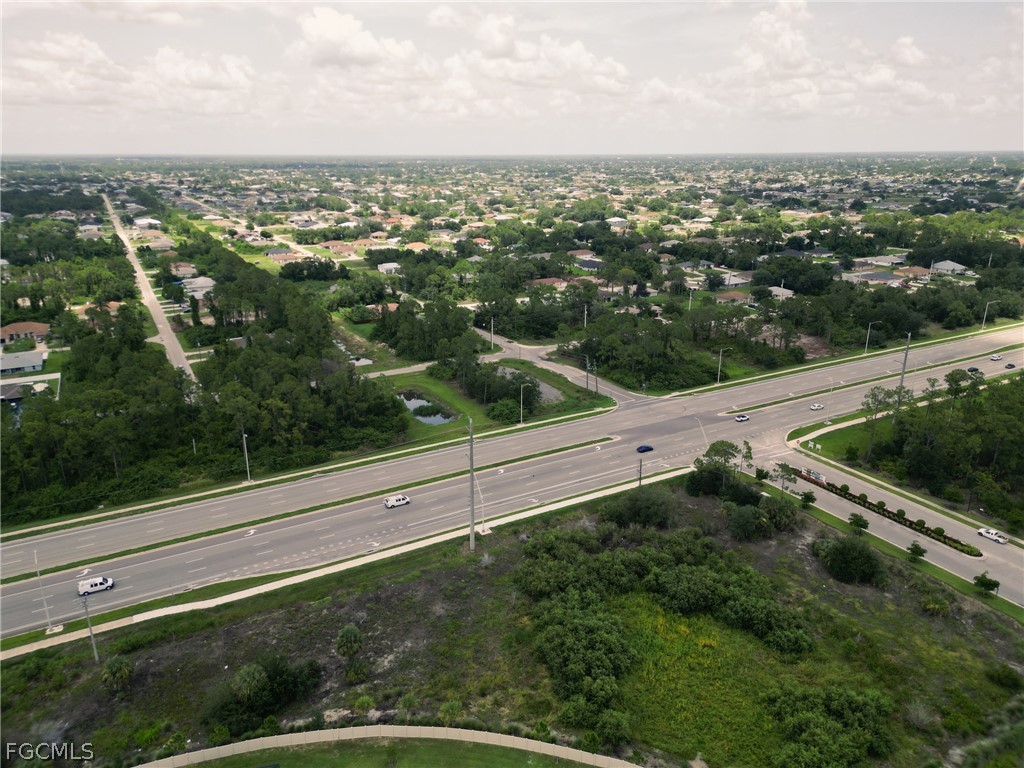 910 Meadow Road Lehigh Acres, FL 33913 - Photo 7 of 12 a view of a city from a terrace