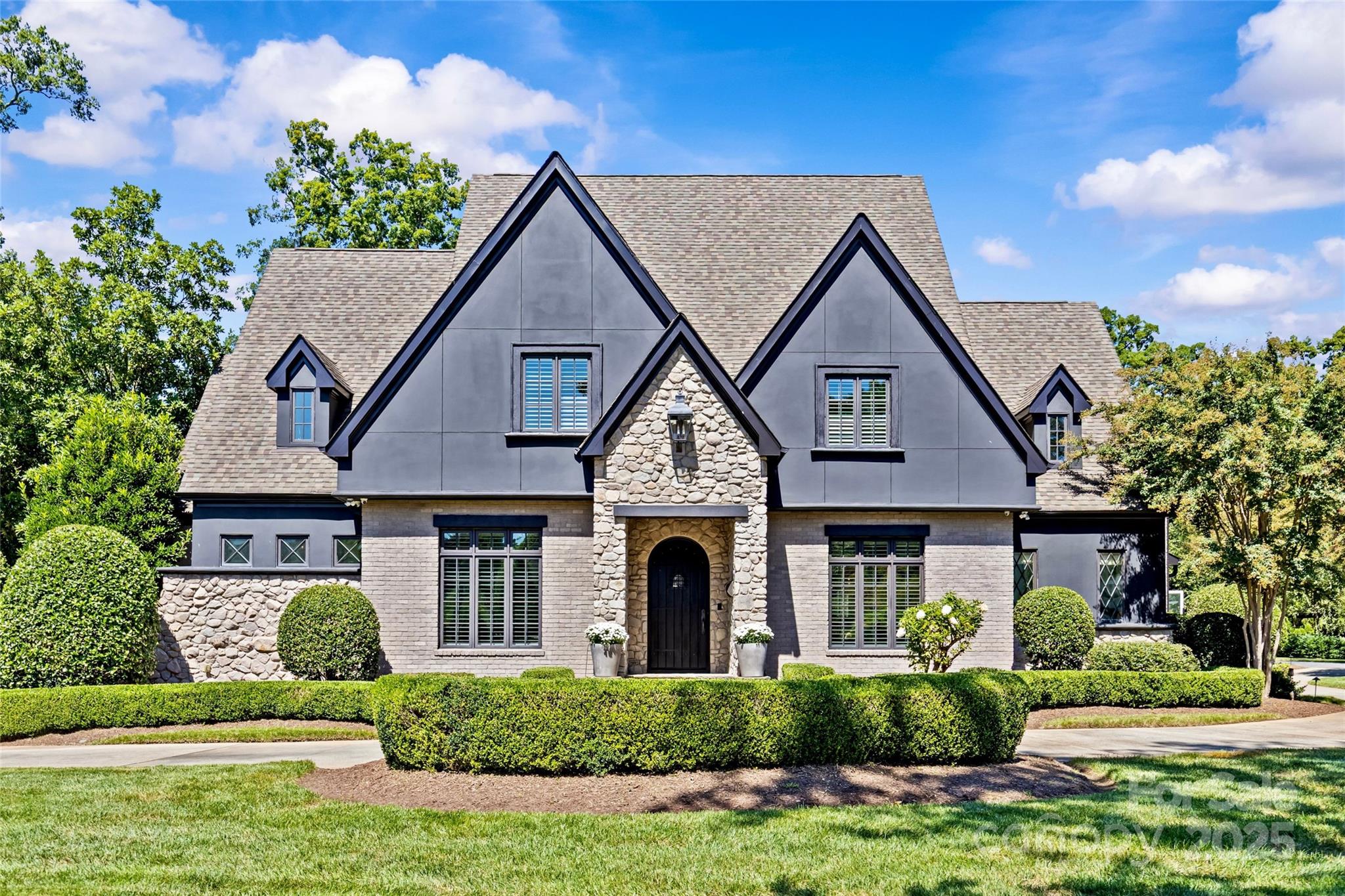 2130 Ferncliff Road Charlotte, NC 28211 - Photo 2 of 3 a front view of a house with a yard