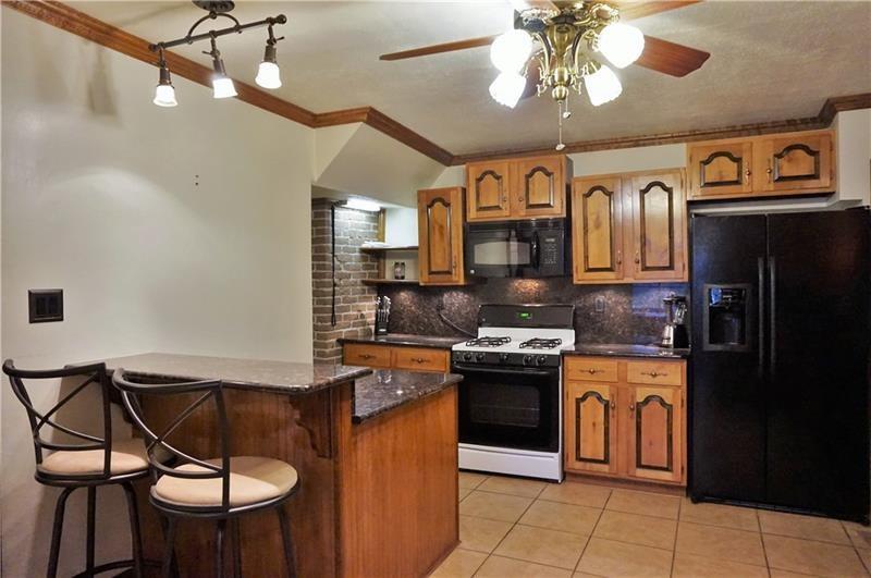 114 Lorish Road McKees Rocks, PA 15136 - Photo 8 of 23 Breakfast bar adds tons of counter space