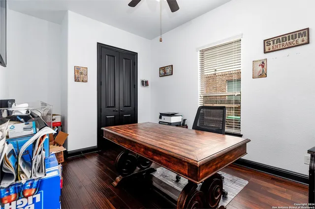 a room with furniture and wooden floor