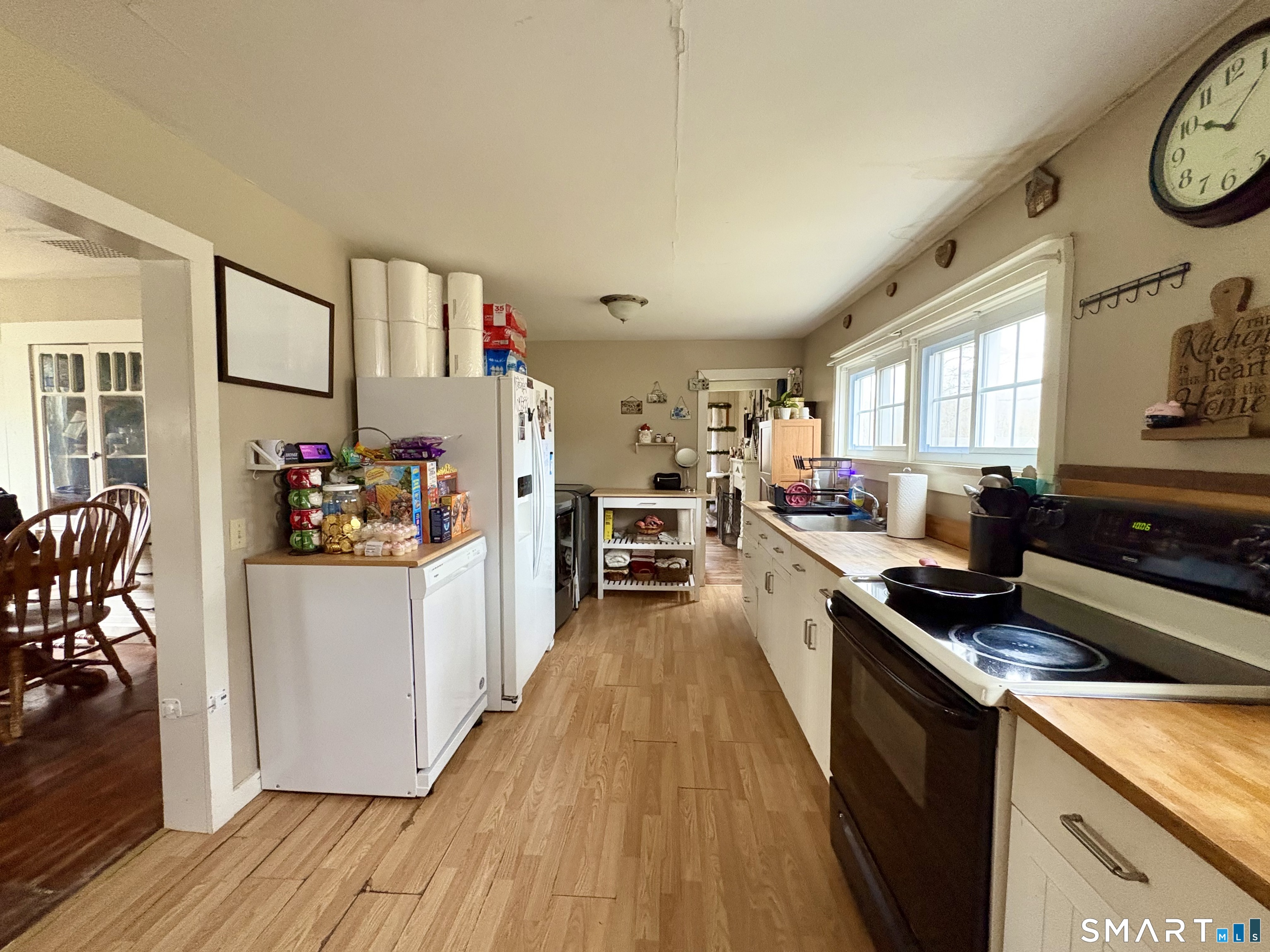 279 River Road Putnam, CT 06260 - Photo 11 of 18 a kitchen with granite countertop lots of counter top space and wooden floor