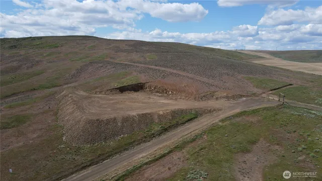 a view of a road with an ocean view