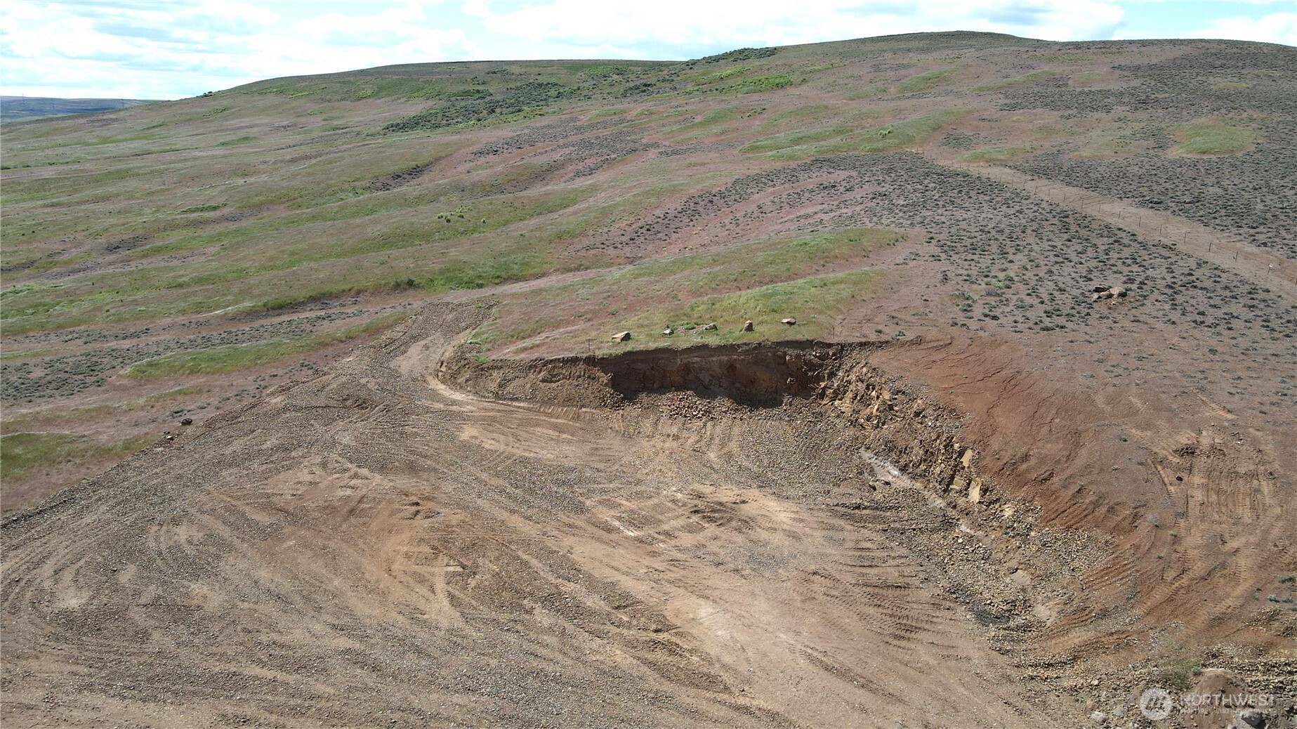 215 Banks Lk Vw Road, Unit 99115 Coulee City, WA 99115 - Photo 6 of 18 a view of a dry yard with mountains in the background