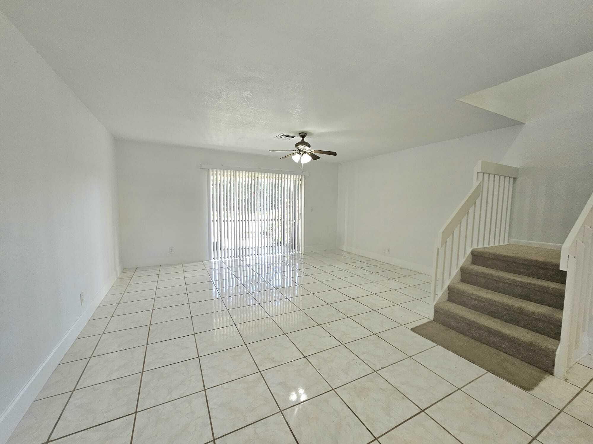 6342 Walk Circle Boca Raton, FL 33433 - Photo 5 of 10 a view of an empty room and stairs