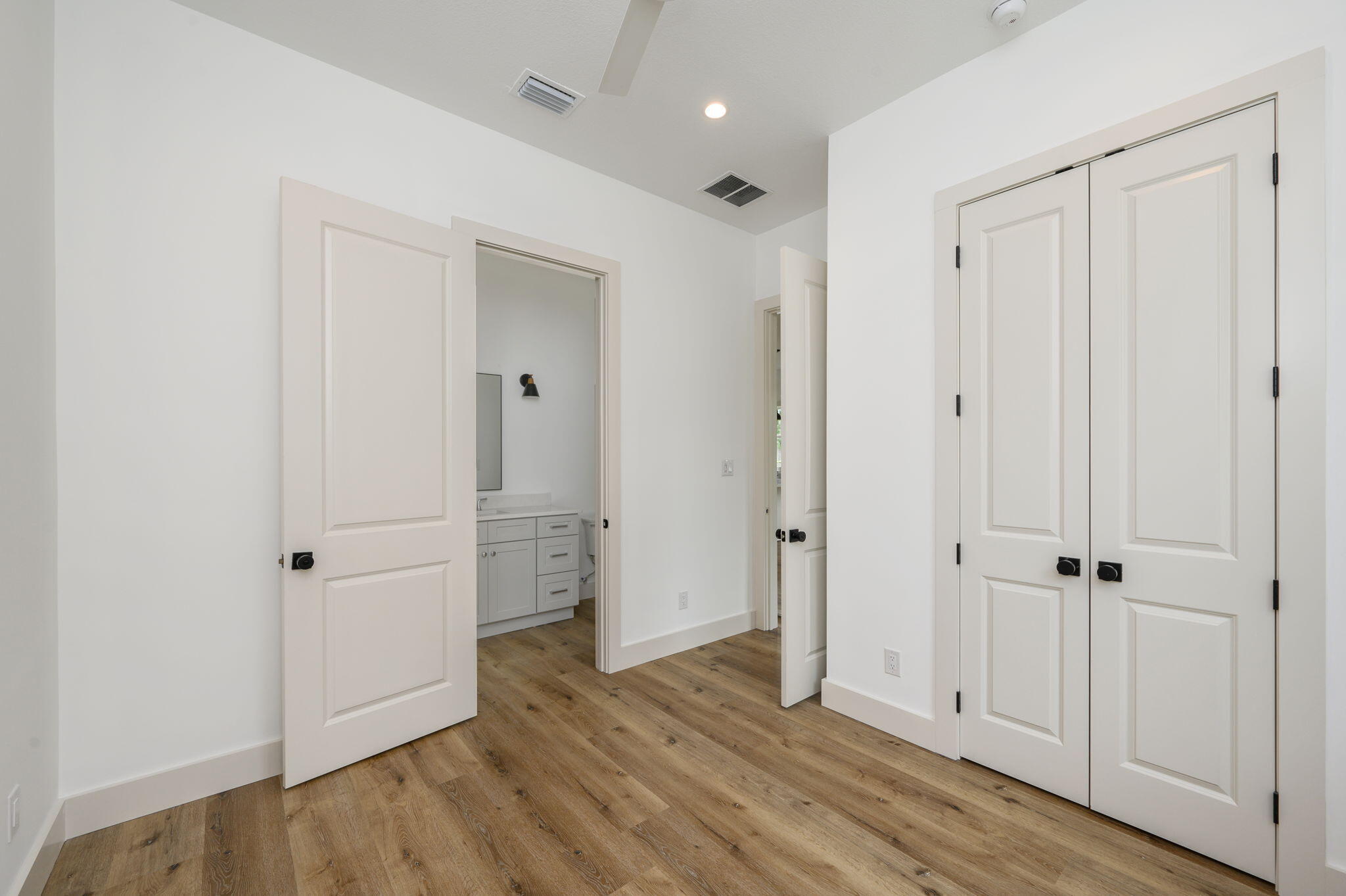 114 Enchanted Way Santa Rosa Beach, FL 32459 - Photo 15 of 38 wooden floor with white walls