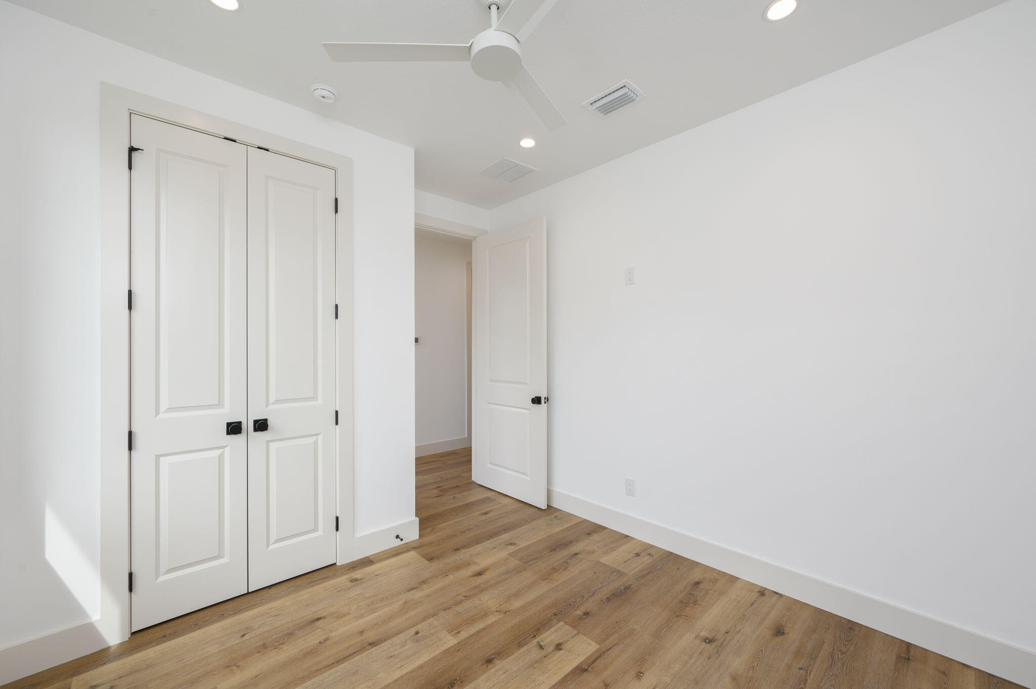 114 Enchanted Way Santa Rosa Beach, FL 32459 - Photo 24 of 38 wooden floor in an empty room