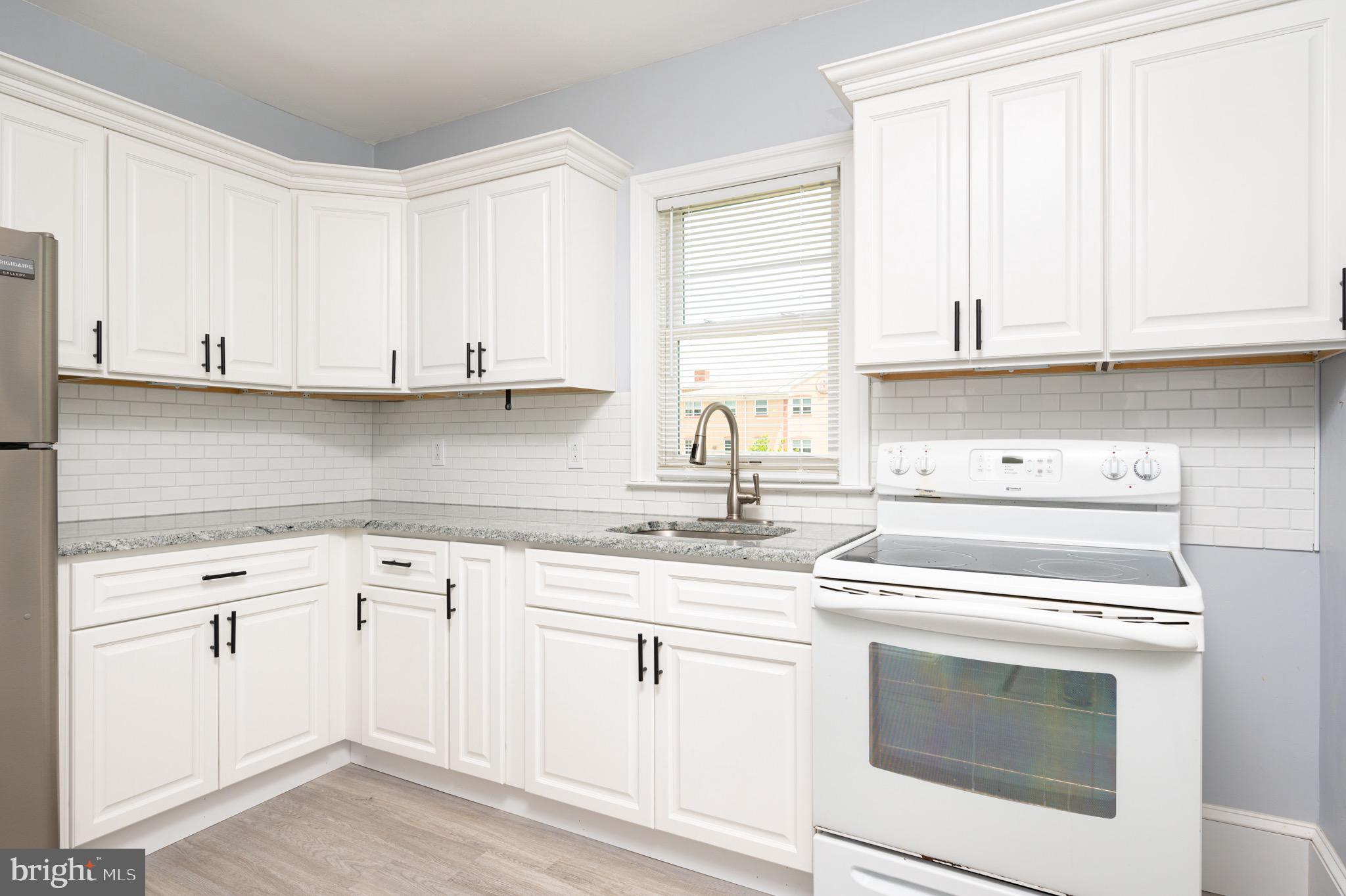 231 South Main Street Spring City, PA 19475 - Photo 8 of 29 Crisp White Cabinets