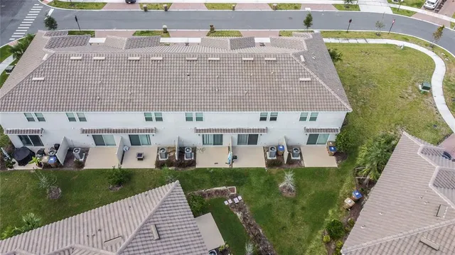 a aerial view of a house with swimming pool