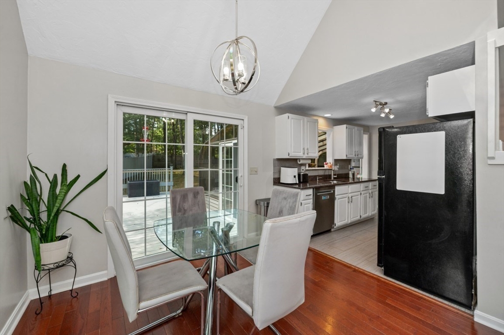 16 Sherborne Circle Ashland, MA 01721 - Photo 11 of 35 a view of a dining room with furniture window and wooden floor