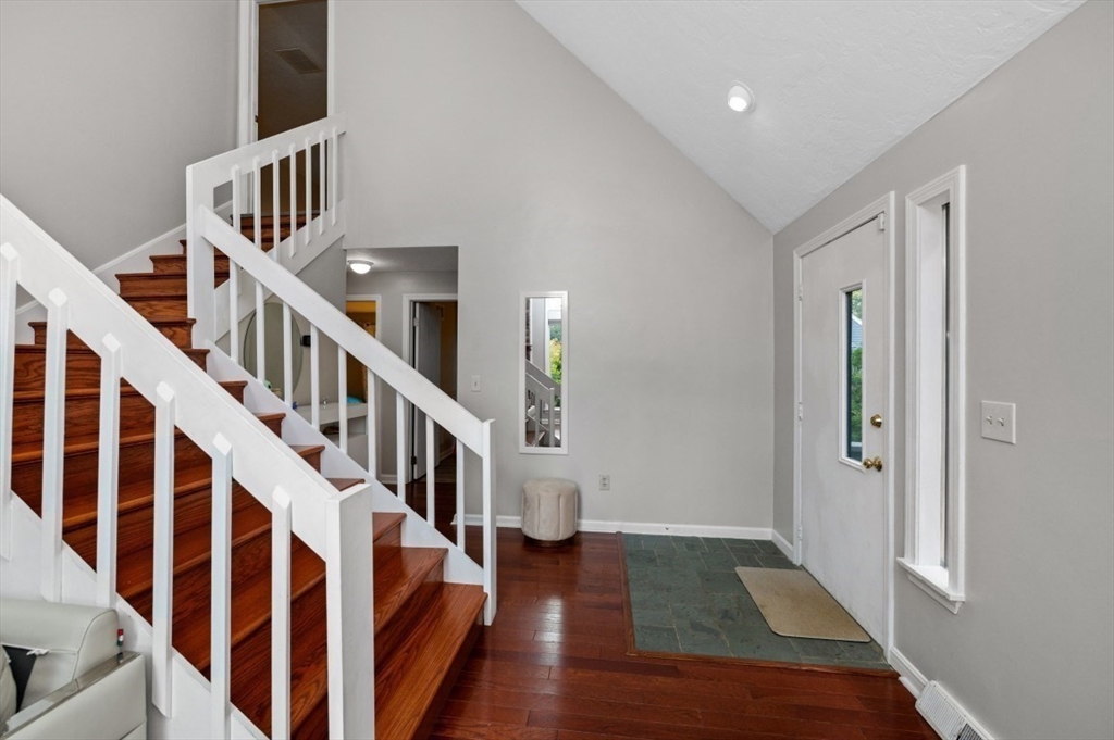 16 Sherborne Circle Ashland, MA 01721 - Photo 13 of 35 a view of an entryway with wooden floor