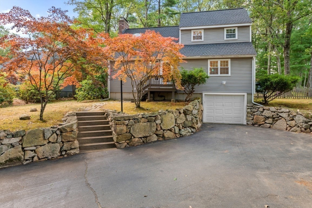 16 Sherborne Circle Ashland, MA 01721 - Photo 2 of 35 front of a house with a yard and garage