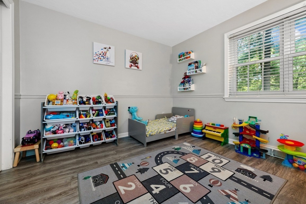 16 Sherborne Circle Ashland, MA 01721 - Photo 23 of 35 a toys and toys in a room with toys