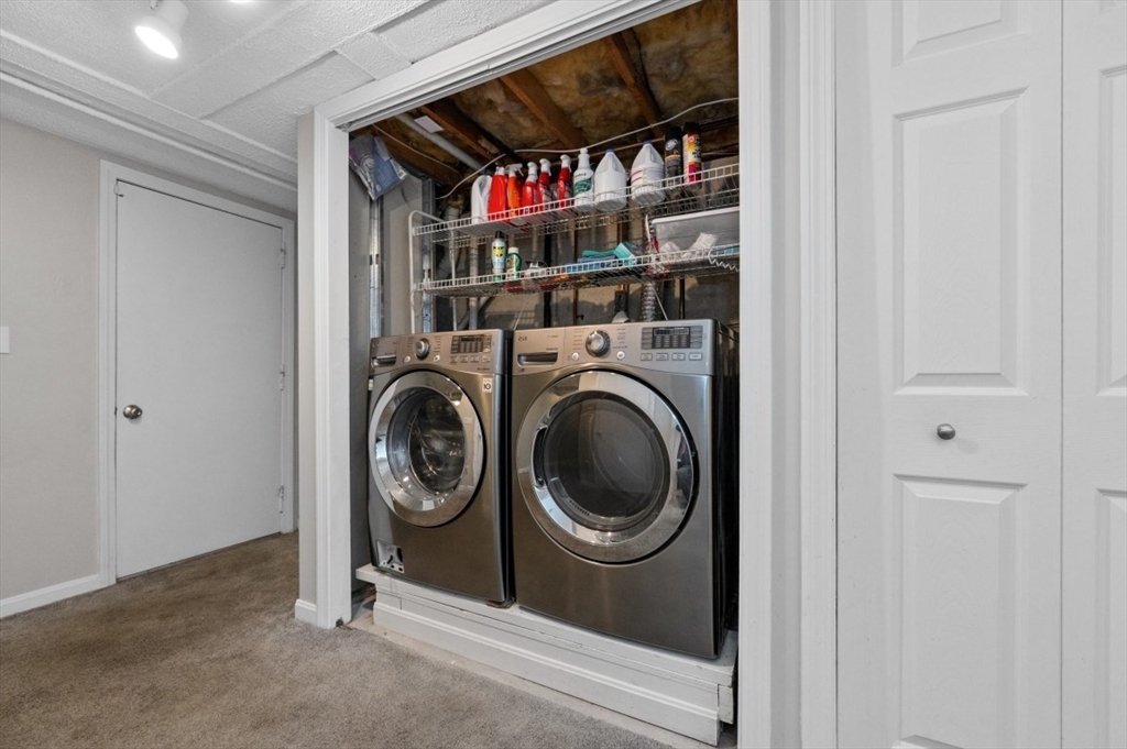 16 Sherborne Circle Ashland, MA 01721 - Photo 33 of 35 a view of livingroom with washer and dryer