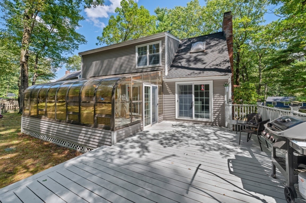 16 Sherborne Circle Ashland, MA 01721 - Photo 7 of 35 a view of a house with backyard and sitting area