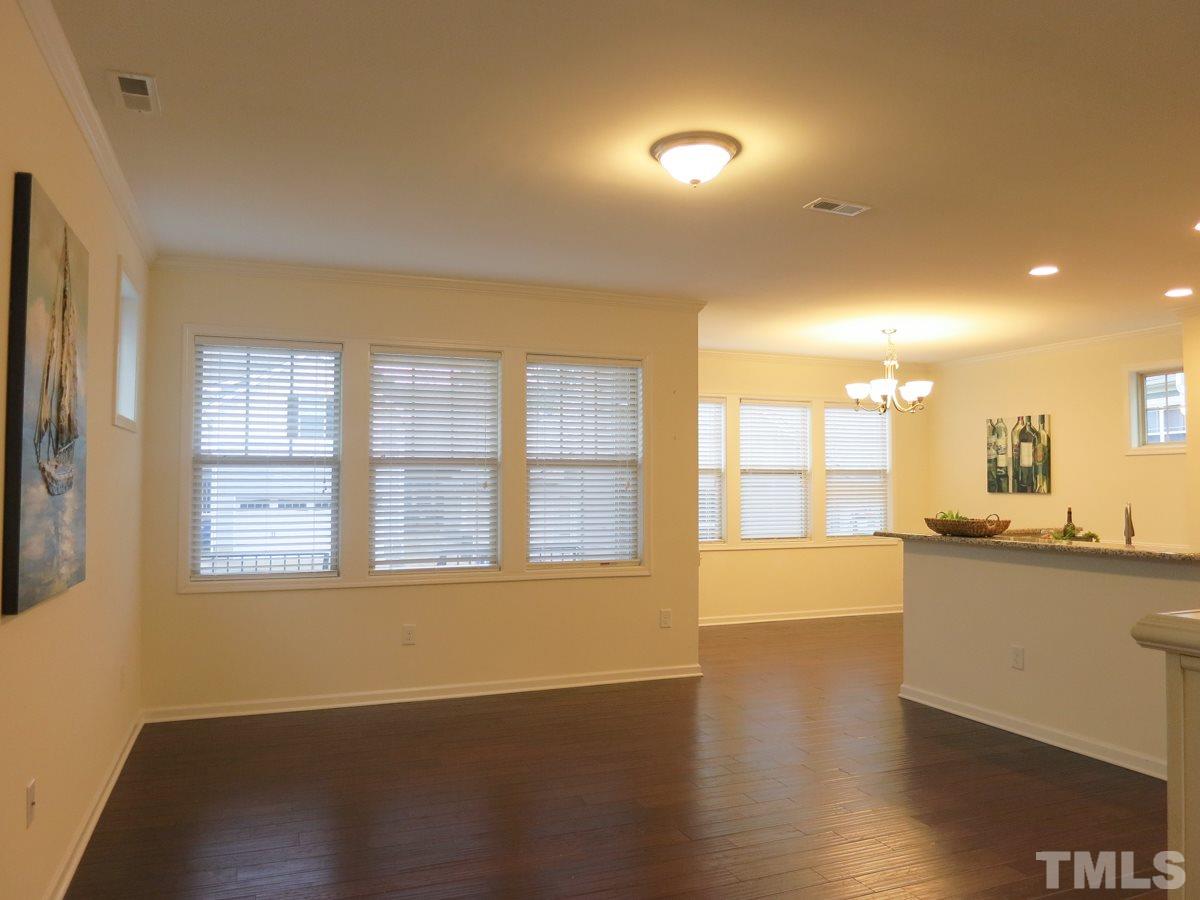 1556 Rodessa Run Raleigh, NC 27607 - Photo 3 of 25 Open Living, Dining & Kitchen area.
